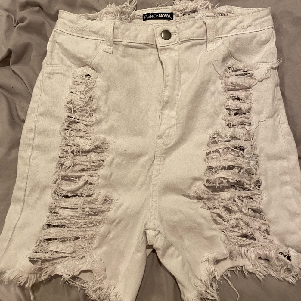 fashion nova white very distressed shorts, never worn just missing tags!